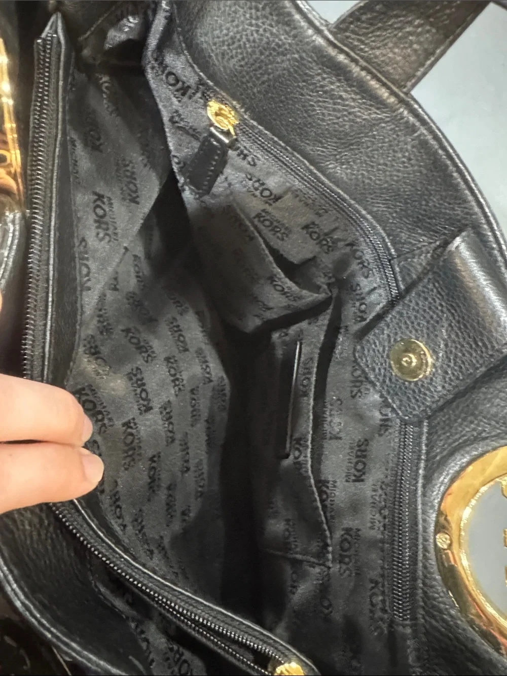 Michael Kors Black Pebbled Leather Tote with Gold MK Medallion